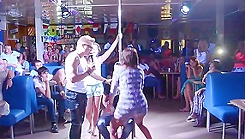 Horny gals give lap dance and grab guys cock