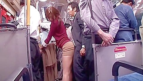 Japanese whore sucks dick in a public bus