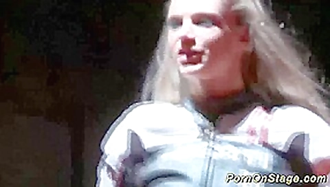 busty blonde orgasm on public stage